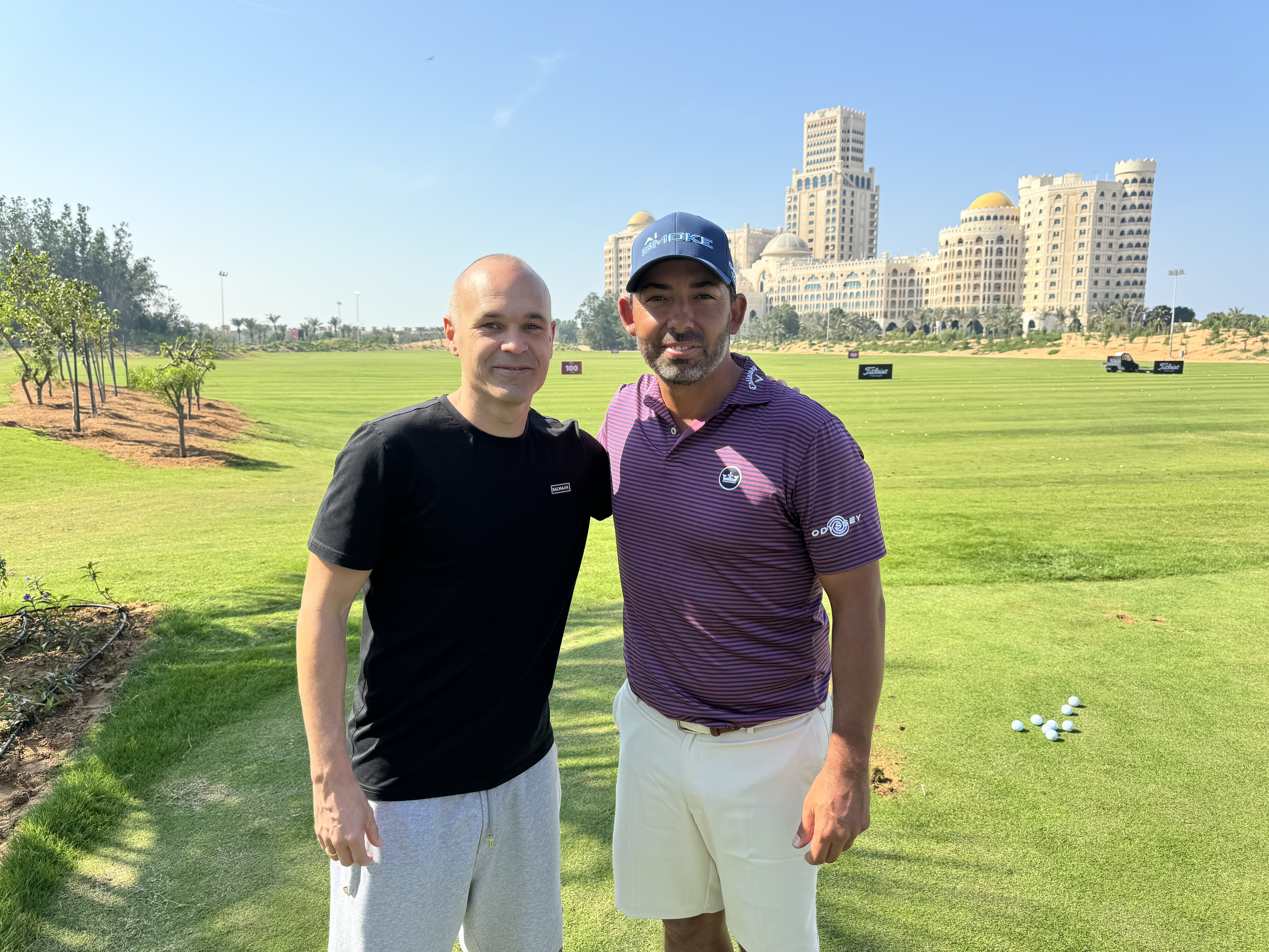 Andres Iniesta (left) and Pablo Larrazabal pictured at Al Hamra Golf Club